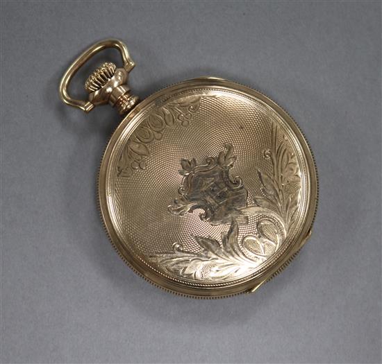 An ornately engraved gold plated Waltham pocket watch.